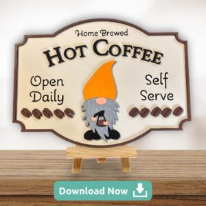 A 3D laser-cut wooden sign featuring a gnome with a bright orange hat holding a coffee cup. The sign reads 'Home Brewed Hot Coffee,' with additional text 'Open Daily' and 'Self Serve,' accented by coffee beans. The sign is displayed on a small wooden easel against a light background.